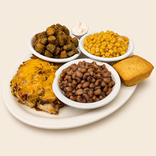 Smothered chicken dinner plate with sides